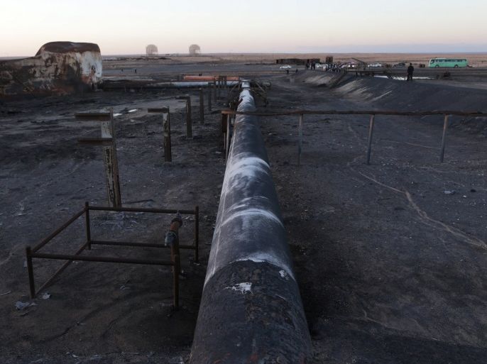 Damaged tanks and pipelines are seen at the oil port of Ras Lanuf, Libya January 11, 2017. Picture taken January 11, 2017. REUTERS/Esam Omran Al-Fetori