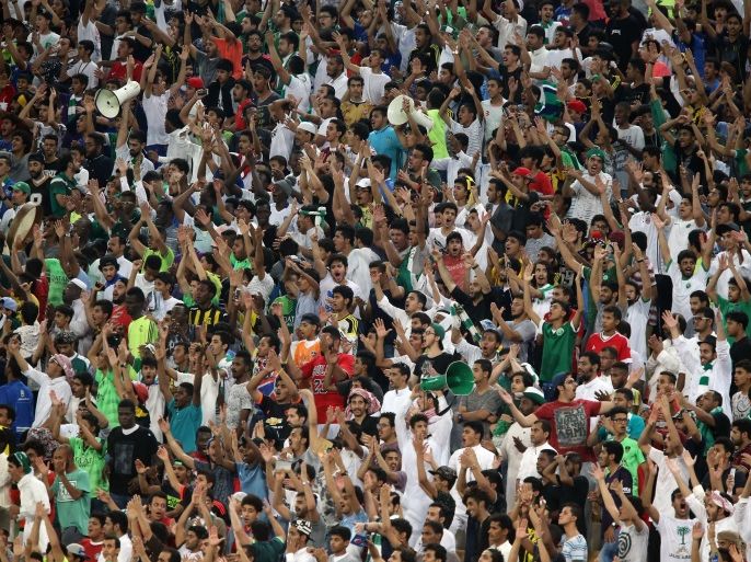 JEDDAH, SAUDI ARABIA, OCTOBER 6: Saudi football fans support their team during the match between Saudi Arabia and Australia for the FIFA World Cup Qualifier Russia 2018, at the Diamond Stadium in Jeddah, Saudi Arabia, October 6, 2016. (Photo by Jordan Pix/ Getty Images)