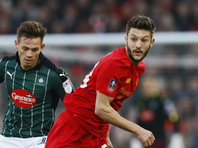 Britain Football Soccer - Liverpool v Plymouth Argyle - FA Cup Third Round - Anfield - 8/1/17 Liverpool's Adam Lallana in action with Plymouth Argyle's Oscar Threlkeld Action Images via Reuters / Jason Cairnduff Livepic EDITORIAL USE ONLY. No use with unauthorized audio, video, data, fixture lists, club/league logos or
