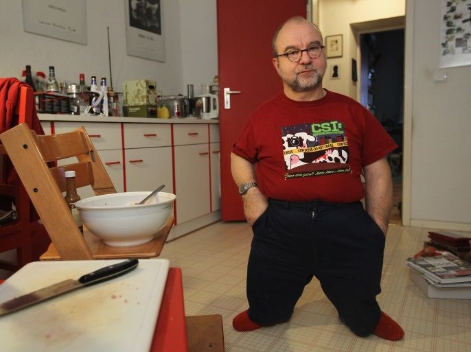 BERLIN, GERMANY - JANUARY 09: Electrical engineer Wolf-Dietrich Molzow, 53, who was born with shortened legs and restricted use of his right arm,pauses while preparing breakfast for himself and his wife Geertje at their apartment on January 9, 2011 in Berlin, Germany. Molzow is convinced that his handicap was caused by the hormone-based pregnancy-testing drug Duogynon, which his mother took before Molzow's birth. On January11, 2011 a Berlin court will reach its verdict in a suit filed by another possible Duogynon victim, Andre Sommer, who is seeking the release of documents related to the drug in the possession of German pharmaceuticals giant Bayer-Schering. Molzow too sought redress through the courts, though his case failed due to a law at the time that stated that potential victims of side-effects caused by drugs had to provide proof of correlation. Sommer's case is seen by many analysts as shaky, as a 30-year statute of limitations could make any responsibility on the part of Bayer-Schering void. Schering produced the drug in tablet form from 1957 until 1980, and the company was repeatedly taken to court, including in 1978 by 580 parents in England who suspected the drug had caused birth defects in their children. In the UK the drug was sold under the name Primodos. (Photo by Sean Gallup/Getty Images)