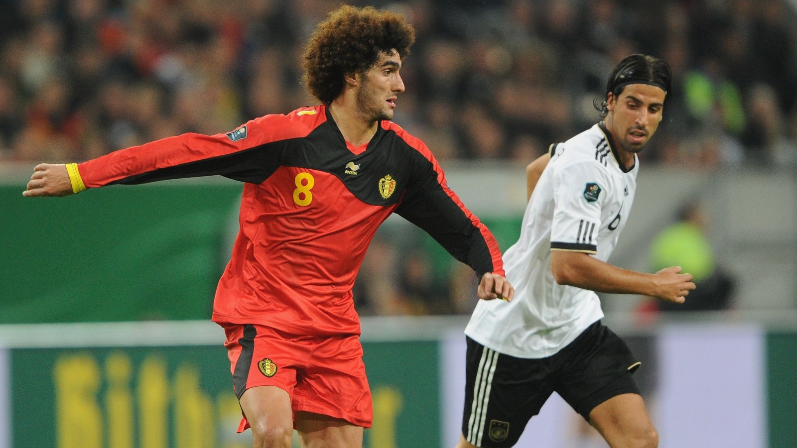 مشاركة كل من سامي خضيرة ذو الأصل التونسي، ومروان فلايني ذو الأصل المغربي في المباراة التي جمعت بين المنتخب الألماني والبلجيكي