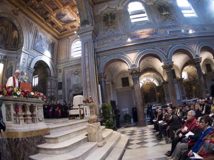 Pope Francis (L) leads a mass at the Basilica of Saint Bartholomew on Tiber island in Rome, April 22, 2017. REUTERS/Maurizio Brambatti/Pool