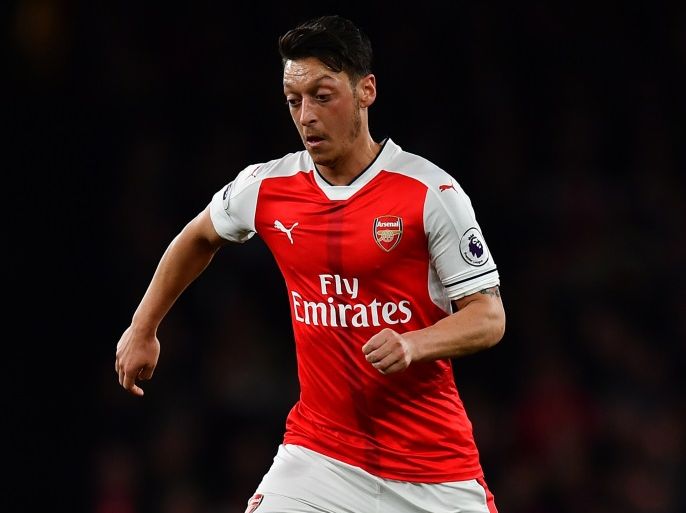LONDON, ENGLAND - APRIL 05: Mesut Ozil of Arsenal looks for a pass during the Premier League match between Arsenal and West Ham United at Emirates Stadium on April 5, 2017 in London, England. (Photo by Dan Mullan/Getty Images)