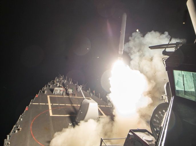 U.S. Navy guided-missile destroyer USS Ross (DDG 71) fires a tomahawk land attack missile in Mediterranean Sea which U.S. Defense Department said was a part of cruise missile strike against Syria on April 7, 2017. Robert S. Price/Courtesy U.S. Navy/Handout via REUTERS ATTENTION EDITORS - THIS IMAGE WAS PROVIDED BY A THIRD PARTY. EDITORIAL USE ONLY.
