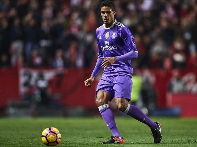 SEVILLE, SPAIN - JANUARY 15: Raphael Varane of Real Madrid CF in action during the La Liga match between Sevilla FC and Real Madrid CF at Estadio Ramon Sanchez Pizjuan on January 15, 2017 in Seville, Spain. (Photo by Aitor Alcalde/Getty Images)