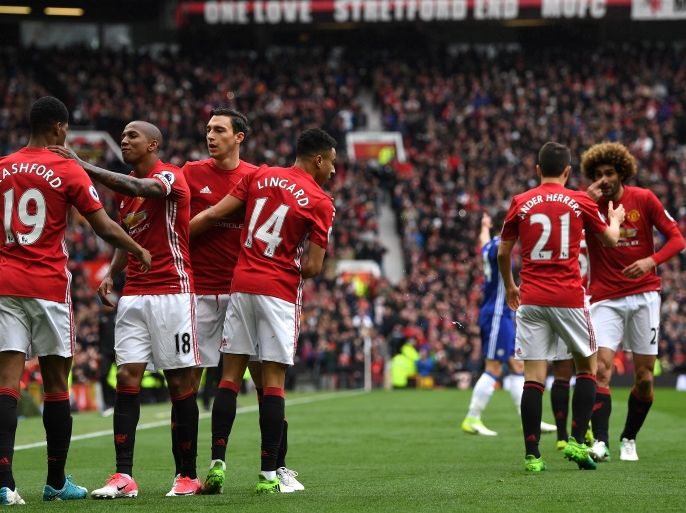 MANCHESTER, ENGLAND - APRIL 16: Marcus Rashford of Manchester United celebrates scoring his sides first goal with his Manchester United team mates during the Premier League match between Manchester United and Chelsea at Old Trafford on April 16, 2017 in Manchester, England. (Photo by Shaun Botterill/Getty Images)