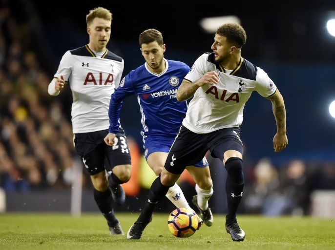 epa05698526 Chelsea's Eden Hazard (C) vies for the ball with Tottenham Hotspur's Christian Eriksen (L) during the English Premier League soccer match between Tottenham Hotspur and Chelsea at the the White Hart Lane Stadium in London, Britain, 04 January 2017. EDITORIAL USE ONLY. No use with unauthorized audio, video, data, fixture lists, club/league logos or 'live' services. Online in-match use limited to 75 images, no video emulation. No use in betting, games or single club/league/player publications EPA/HANNAH MCKAY