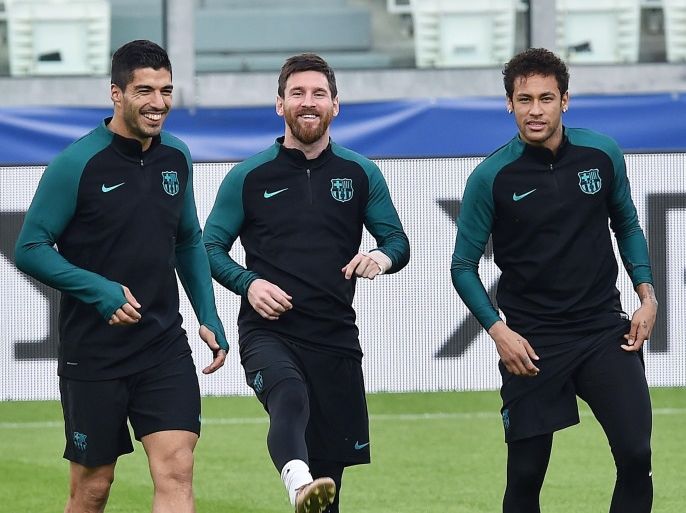 Description epa05901901 Barcelona's forwards Luis Suarez (L), Lionel Messi (C) and Neymar (L), during a training session on the eve of the first leg of quarterfinals Champions League soccer match between Juventus FC and FC Barcelona at Juventus Stadium in Turin, Italy, 10 April 2017. EPA/ALESSANDRO DI MARCO