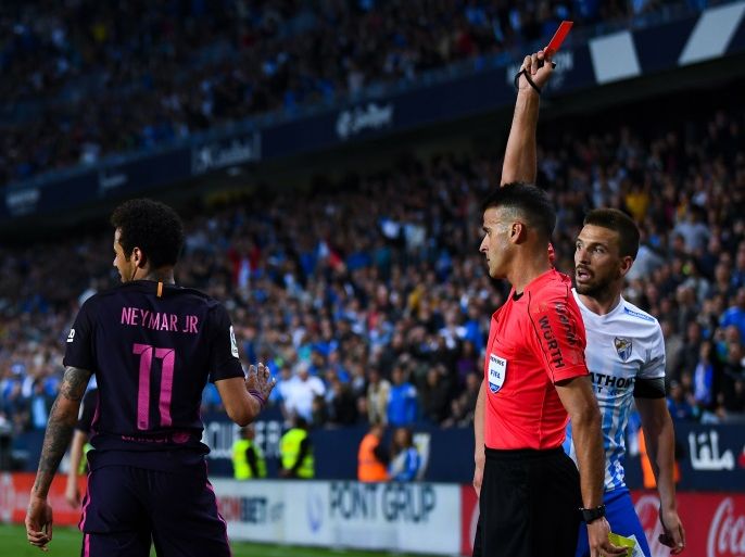 MALAGA, SPAIN - APRIL 08: Neymar Jr. of FC Barcelona is shown a red card during the La Liga match between Malaga CF and FC Barcelona at La Rosaleda stadium on April 8, 2017 in Malaga, Spain. (Photo by David Ramos/Getty Images)