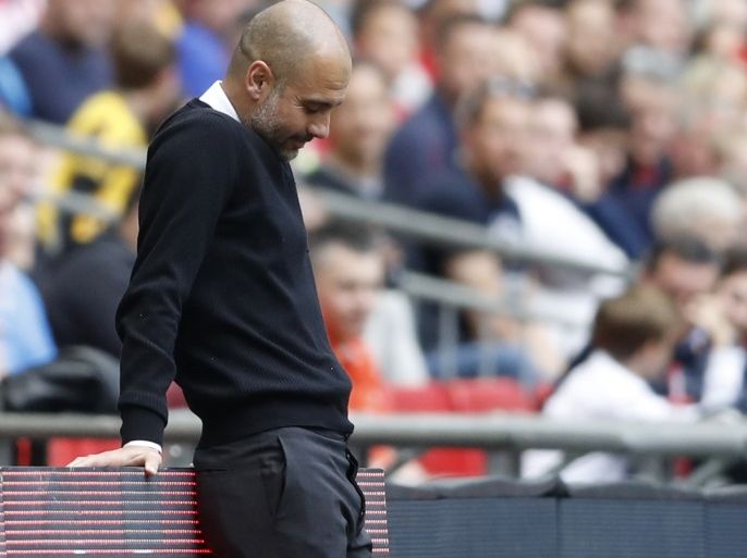 Britain Football Soccer - Arsenal v Manchester City - FA Cup Semi Final - Wembley Stadium - 23/4/17 Manchester City manager Pep Guardiola looks dejected Action Images via Reuters / Carl Recine Livepic EDITORIAL USE ONLY. No use with unauthorized audio, video, data, fixture lists, club/league logos or