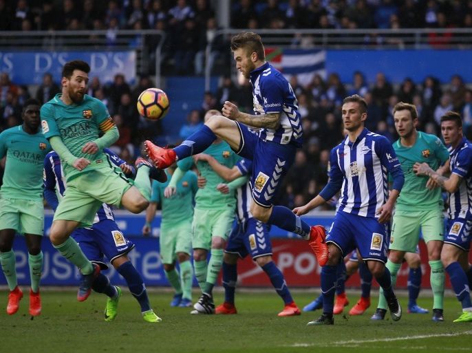 VITORIA-GASTEIZ, SPAIN - FEBRUARY 11: Lionel Messi (L) of FC Barcelona competes for the ball with Aleksandar Katai (R) of Deportivo Alaves during the La Liga match between Deportivo Alaves and FC Barcelona at Estadio de Mendizorroza on February 11, 2017 in Vitoria-Gasteiz, Spain. (Photo by Gonzalo Arroyo Moreno/Getty Images)