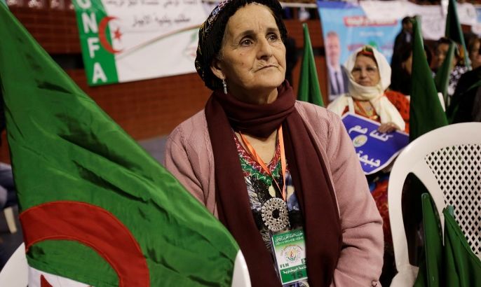 A supporter of algerian party the National Liberation Front (FLN), attends an election campaign rally in Algiers, Algeria April 28,2017. Picture taken April 28, 2017. REUTERS/Ramzi Boudina?