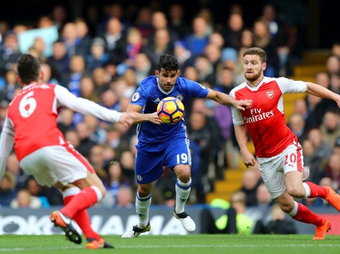LONDON, ENGLAND - FEBRUARY 04: Diego Costa of Chelsea battles for the ball with Shkodran Mustafi of Arsenal during the Premier League match between Chelsea and Arsenal at Stamford Bridge on February 4, 2017 in London, England. (Photo by Clive Rose/Getty Images)