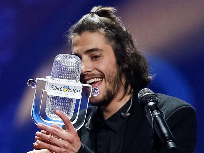 Portugal's Salvador Sobral celebrates after winning the grand final of the Eurovision Song Contest 2017 at the International Exhibition Centre in Kiev, Ukraine, May 14, 2017. REUTERS/Gleb Garanich