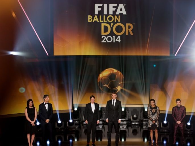 ZURICH, SWITZERLAND - JANUARY 12: Nadine Kessler of Germany and VfL Wolfsburg, Cristiano Ronaldo of Portugal and Real Madrid, Abby Wambach of USA and Western New York Flash, Manuel Neuer of Germany and FC Bayern Munich, Marta Vieira da Silva of Brazil and Tyreso FF and Lionel Messi of Argentina and FC Barcelona (L-R) stand on the stage during the FIFA Ballon d'Or Gala 2014 at the Kongresshaus on January 12, 2015 in Zurich, Switzerland. (Photo by Philipp Schmidli/Getty Images)