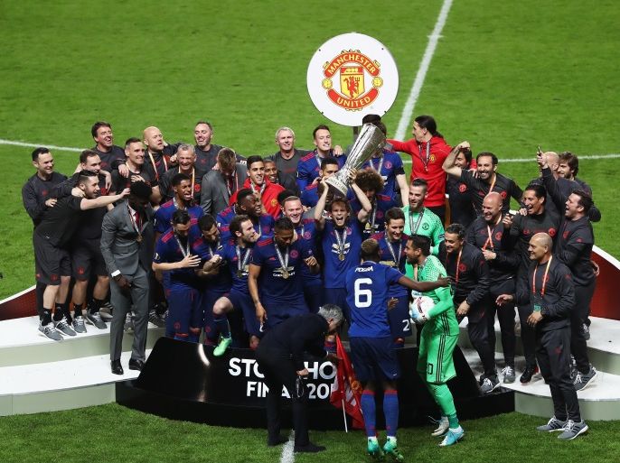 STOCKHOLM, SWEDEN - MAY 24: Daley Blind of Manchester United lifts The Europa League trophy after the UEFA Europa League Final between Ajax and Manchester United at Friends Arena on May 24, 2017 in Stockholm, Sweden. (Photo by Alex Grimm/Getty Images)