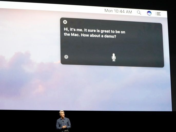 Craig Federighi, Senior Vice President of Software Engineering for Apple Inc, discusses the Siri desktop assistant for Mac OS Sierra at the company's World Wide Developers Conference in San Francisco, California, U.S. June 13, 2016. REUTERS/Stephen Lam