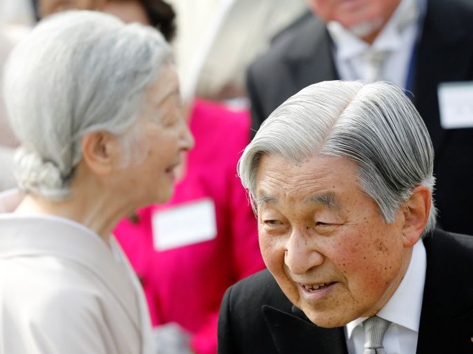 Japan's Emperor Akihito and Empress Michiko attend the annual spring garden party at the Akasaka Palace imperial garden in Tokyo, Japan April 20, 2017. REUTERS/Toru Hanai
