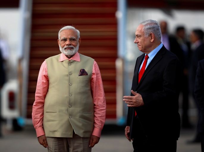 Indian Prime Minister Narendra Modi stands next to Israeli Prime Minister Benjamin Netanyahu during a farewell ceremony upon Modi's departure from Israel at Ben Gurion International Airport, near Tel Aviv, Israel July 6, 2017. REUTERS/Amir Cohen
