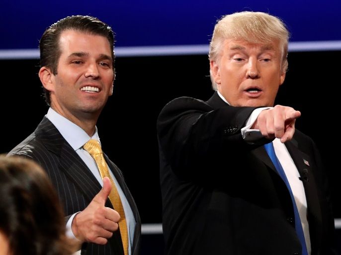 Donald Trump Jr. (L) gives a thumbs up beside his father Republican U.S. presidential nominee Donald Trump (R) after Trump's debate against Democratic nominee Hillary Clinton at Hofstra University in Hempstead, New York, U.S. September 26, 2016. REUTERS/Mike Segar