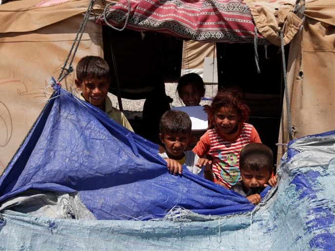 Displaced children who fled their homes are seen at a refugee camp in Mosul, Iraq July 17, 2017. Picture taken July 17, 2017. REUTERS/Azad Lashkari