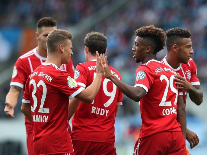 CHEMNITZ, GERMANY - AUGUST 12: Kingsley Coman (2nd R) of Muenchen celebrates after scoring his team's second goal with Joshua Kimmich (L-R), Sebastian Rudy and Corentin Tolisso of Muenchen during the DFB Cup first round match between Chemnitzer FC and FC Bayern Muenchen at community4you Arena on August 12, 2017 in Chemnitz, Germany. (Photo by Ronny Hartmann/Bongarts/Getty Images)