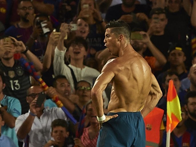 BARCELONA, SPAIN - AUGUST 13: Cristiano Ronaldo of Real Madrid celebrates scoring his team's second goal during the Supercopa de Espana Supercopa Final 1st Leg match between FC Barcelona and Real Madrid at Camp Nou on August 13, 2017 in Barcelona, Spain. (Photo by Manuel Queimadelos Alonso/Getty Images,)
