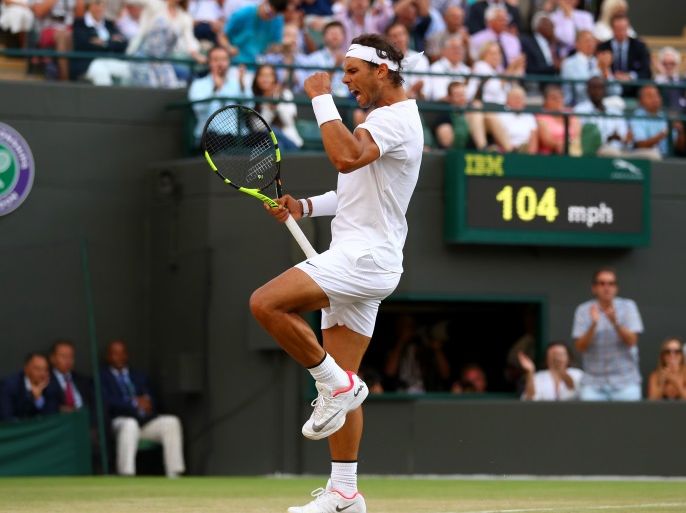 LONDON, ENGLAND - JULY 10: Rafael Nadal of Spain celebrates during the Gentlemen's Singles fourth round match against Gilles Muller of Luxembourg on day seven of the Wimbledon Lawn Tennis Championships at the All England Lawn Tennis and Croquet Club on July 10, 2017 in London, England. (Photo by Michael Steele/Getty Images)