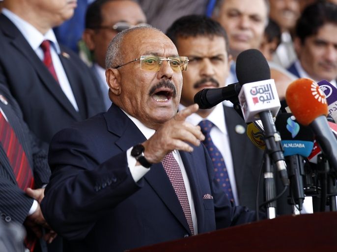 Yemen's ex-president Ali Abdullah Saleh gives a speech addressing his supporters during a rally as his political party, the General People's Congress, marks 35 years since its founding, at Sabaeen Square in the capital Sanaa on August 24, 2017. The rally comes amid reports that armed supporters of Saleh and the head of the country's Huthi rebels, who have been allied against the Saudi-backed government since 2014, had spread throughout the capital as tensions are ris