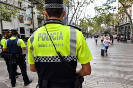 Police officers stand guard on the Las Ramblas boulevard in Barcelona on August 19, 2017, two days after a van ploughed into the crowd, killing 13 persons and injuring over 100.Drivers have ploughed on August 17, 2017 into pedestrians in two quick-succession, separate attacks in Barcelona and another popular Spanish seaside city, leaving 14 people dead and injuring more than 100 others. / AFP PHOTO / Pascal GUYOT (Photo credit should read PASCAL GUYOT/AFP/Getty Images)