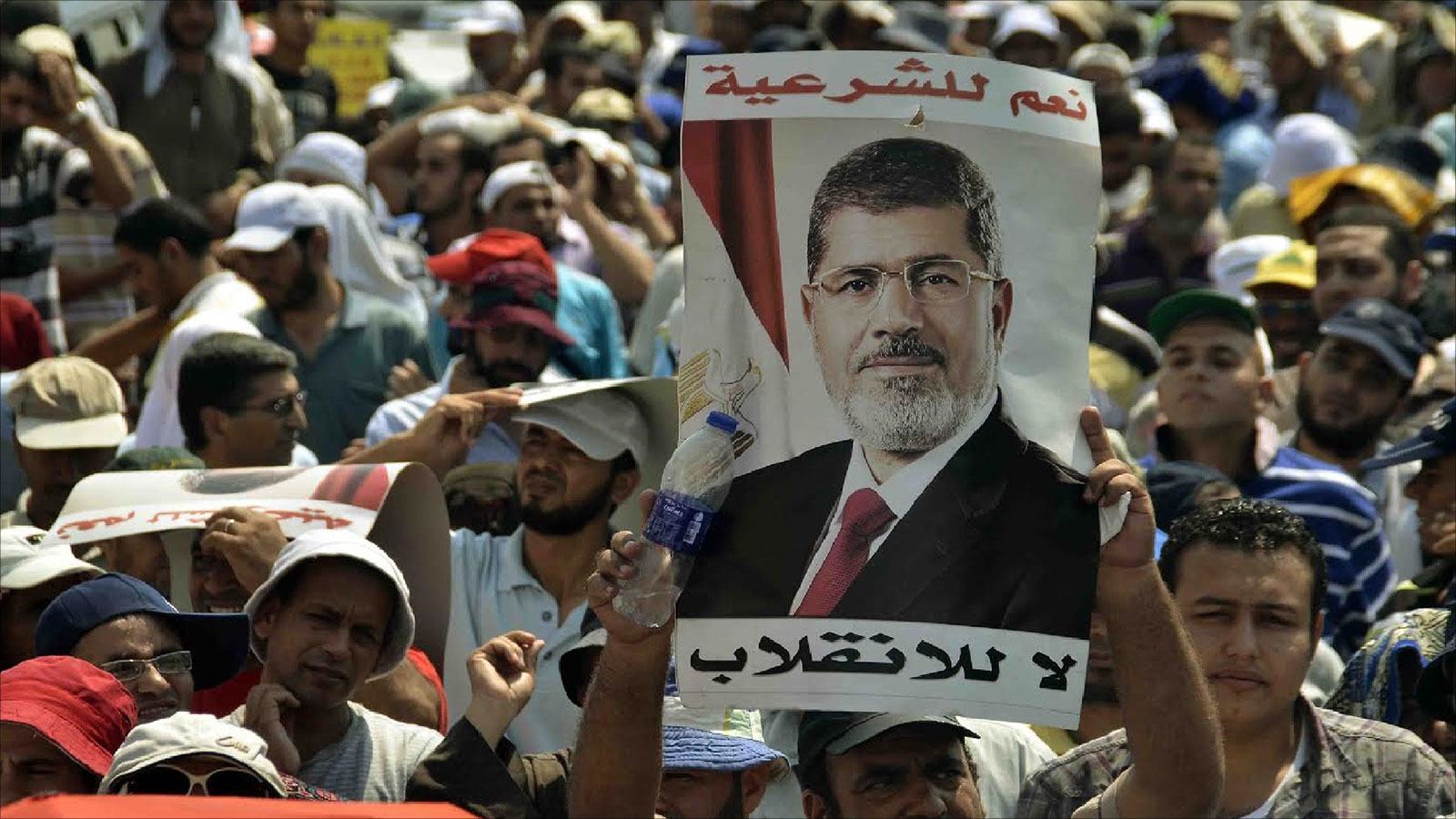 ‪مصر ما تزال تشهد مظاهرات تؤكد على التمسك بالشرعية ورفض الانقلاب‬ مصر ما تزال تشهد مظاهرات تؤكد على التمسك بالشرعية ورفض الانقلاب (الجزيرة)