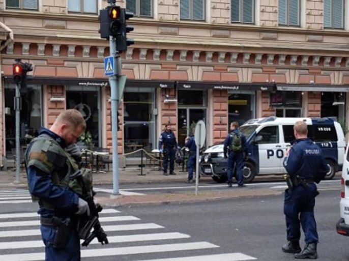 A photo taken from the instagram account of BernatMajo shows police officers patroling in a street in the Finnish city of Turku where several people were stabbed on August 18, 2017. Several people were stabbed in the street in the Finnish city of Turku with police shooting one suspect and warning several others could still be at large. Police had yet to confirm how many people had been wounded but witnesses said they had seen several bodies lying on the ground in a busy
