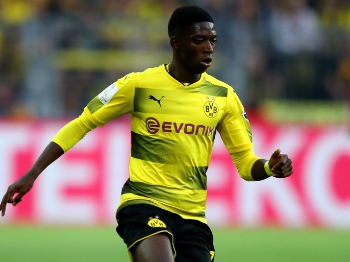 DORTMUND, GERMANY - AUGUST 05: Ousmane Dembélé of Dortmund runs with the ball during the DFL Supercup 2017 match between Borussia Dortmund and Bayern Muenchen at Signal Iduna Park on August 5, 2017 in Dortmund, Germany. (Photo by Martin Rose/Bongarts/Getty Images)