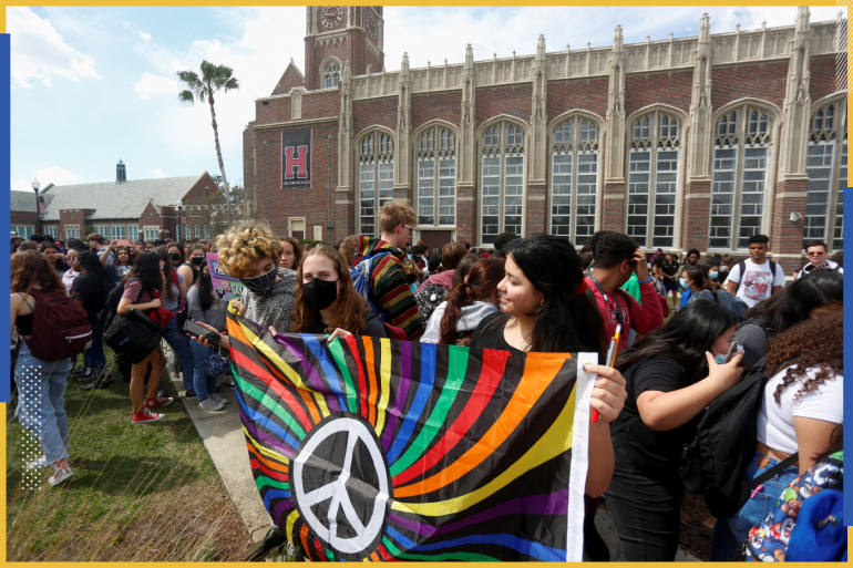 Hillsborough High School students protest a Republican-backed bill dubbed the "Don't Say Gay" that would prohibit classroom discussion of sexual orientation and gender identity, a measure Democrats denounced as being anti-LGBTQ, in Tampa, Florida, U.S., March 3, 2022. REUTERS/Octavio Jones