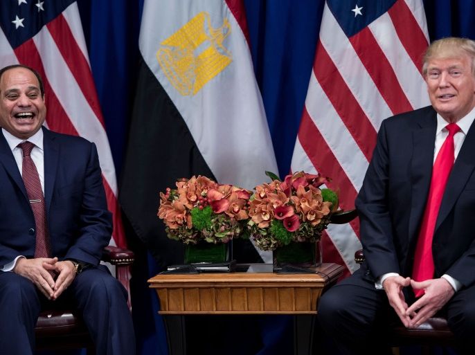 Egypt's President Abdel Fattah el-Sisi laughs while US President Donald Trump make a statement to the press before a meeting at the Palace Hotel during the 72nd United Nations General Assembly September 20, 2017 in New York City. / AFP PHOTO / Brendan Smialowski (Photo credit should read BRENDAN SMIALOWSKI/AFP/Getty Images)