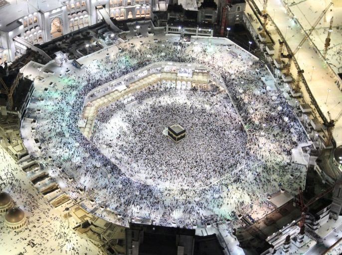 An aerial view shows Muslim pilgrims circumambulating the Kaaba, Islam's holiest shrine, at the Grand Mosque in Saudi Arabia's holy city of Mecca on September 3, 2017, during the annual Hajj pilgrimage. / AFP PHOTO / BANDAR ALDANDANI (Photo credit should read BANDAR ALDANDANI/AFP/Getty Images)