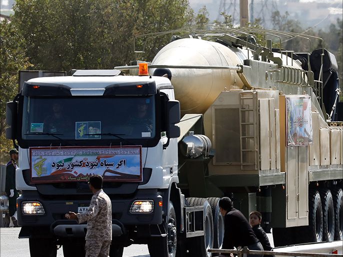 epa06218987 Iranian long range missile Khoramshahr is displayed during the annual military parade marking the Iraqi invasion in 1980, which led to an eight-year-long war (1980-1988) in Tehran, Iran, 22 September 2017. Media reported that Rouhani said that our military power is just to defend ourselves against world powers and terrorism. EPA-EFE/Abedin Taherkenareh