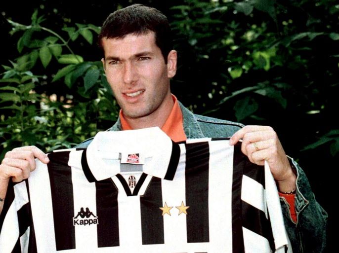 epa00698473 (FILES) A file photograph dated 03 July 1996 showing French soccer player Zinedine Zidane as he shows the jersey of Juventus FC during his presentation in Turin. Zidane announced on Tuesday 25 April 2006 during an interview with French TV Canal + that he will retire after the soccer World Cup Germany 2006. The 33-year-old, Zidane became the world's most expensive footballer when Real signed him from Juventus for $66 million in 2001 and he scored a superb winner to earn Real their ninth European Cup in the 2002 final against Bayer Leverkusen. EPA/LA PRESSE / HANDOUT