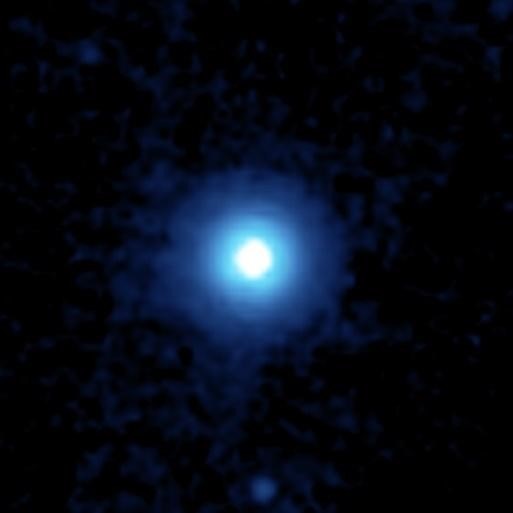  صورة التلِسكوب سبيتزر لنَجم النسر الواقع، كما تلاحظ هناك سحابة ضخمة من الغبار تحيط به، تصور العلماء في البداية أنها بدايات تكوّن كوكب، مصدر الصورة وكالة ناسا  (مواقع التواصل )