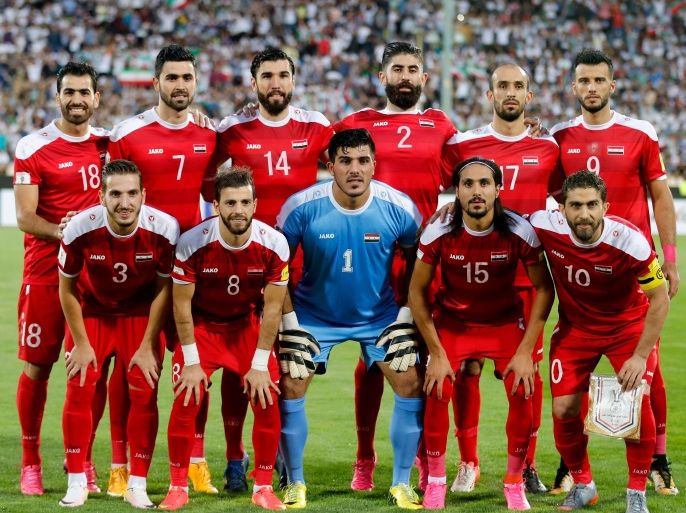 (From top L) Syrian players Mohamed Madanieh, Omar Khrbin, Tamer Mohamed, Ahmad al-Saleh, Hadi al-Masri, Omar al-Soma, (from bottom L) Mouaiad al-Ajjan, Mahmoud al-Mawas, Ibrahim Alma, Alaa Shbbli and Firas al-Khatib pose for a group picture prior to the FIFA World Cup 2018 qualification football match between Syria and Iran at the Azadi Stadium in Tehran on September 5, 2017. / AFP PHOTO / ATTA KENARE (Photo credit should read ATTA KENARE/AFP/Getty Images)