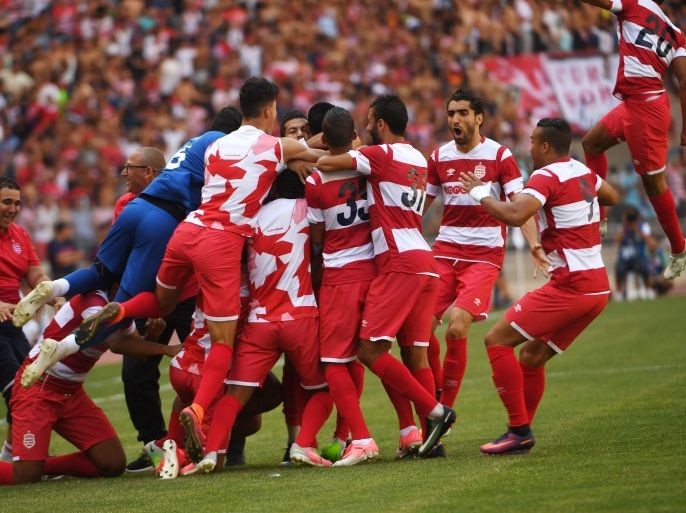 Club Africain's team celebrates after scoring a goal during the final of the Tunisian Cup, Club Africain versus Ben Guerdane, on June 17, 2017 at the Olympic Stadium in Rades, near Tunis.Club African defeated Ben Guerdane 1-0. / AFP PHOTO / FETHI BELAID (Photo credit should read FETHI BELAID/AFP/Getty Images)