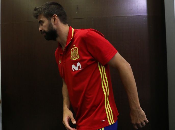 Spain's national soccer team player Gerard Pique leaves after giving a news conference at the training grounds in Las Rozas, outside Madrid, October 4, 2017. REUTERS/Sergio Perez