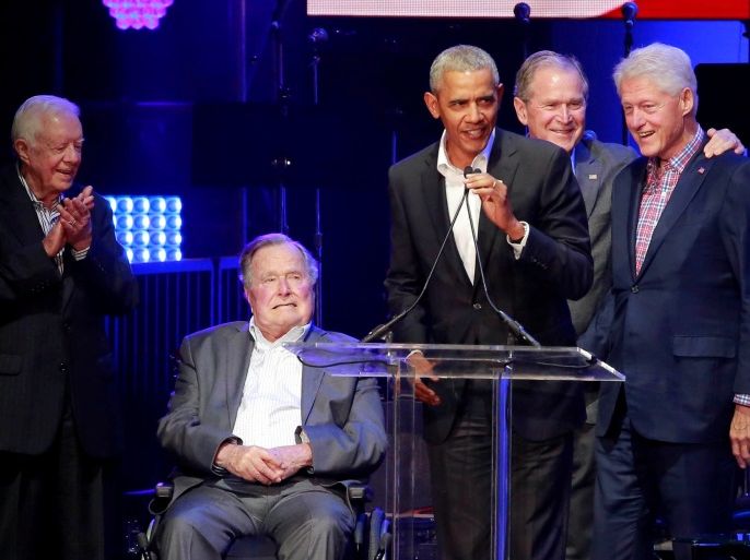 Five former U.S. presidents, Jimmy Carter, George H.W. Bush, Barack Obama, George W. Bush and Bill Clinton, speak during a concert at Texas A&M University benefiting hurricane relief efforts in College Station, Texas, U.S., October 21, 2017. REUTERS/Richard Carson TPX IMAGES OF THE DAY