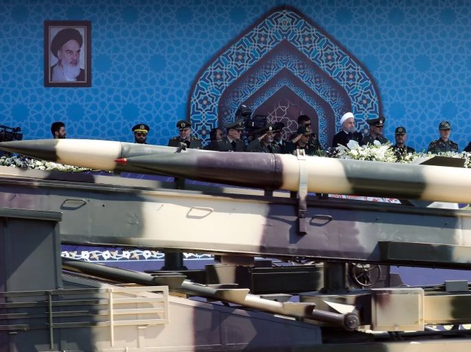 An Iranian medium range missile Zelzal passes by Iranian President Hassan Rouhani (C) during the annual military parade marking the anniversary of the outbreak of its devastating 1980-1988 war with Saddam Hussein's Iraq, on September 22, 2017 in Tehran.Rouhani vowed that Iran would boost its ballistic missile capabilities despite criticism from the United States and also France. / AFP PHOTO / str (Photo credit should read STR/AFP/Getty Images)
