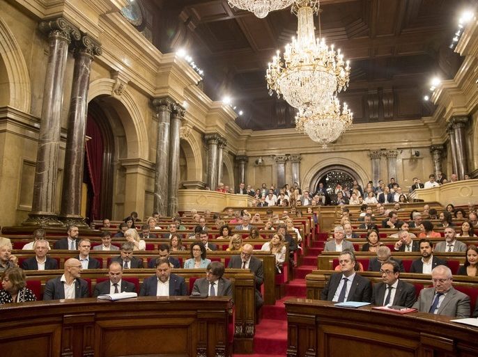 epa06246273 (FILE) - Catalonian Parliament members attend a parliamentary session to vote on the referendum law at Parliament in Barcelona, Spain, 06 September 2017 (reissued 05 October 2017). According to media reports on 05 October 2017, Spain's Constitutional Court has ruled to suspend a session of the Catalonian Parliament scheduled for 09 October in an effort to prevent a push for independence. EPA-EFE/MARTA PEREZ