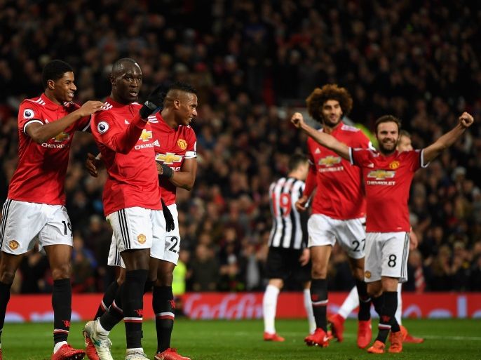 MANCHESTER, ENGLAND - NOVEMBER 18: Romelu Lukaku of Manchester United celebrates with team mates after scoring his sides fourth goal during the Premier League match between Manchester United and Newcastle United at Old Trafford on November 18, 2017 in Manchester, England. (Photo by Gareth Copley/Getty Images)