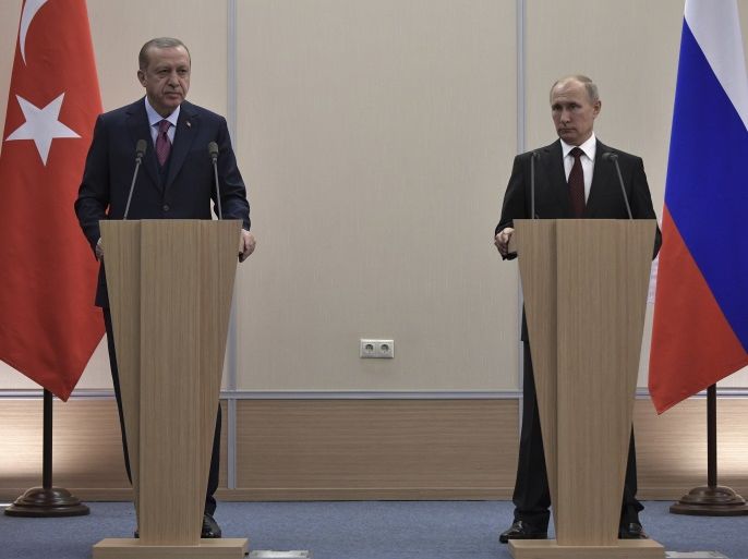 Russia's President Vladimir Putin (R) and Turkey's President Tayyip Erdogan attend a news conference after the talks in Sochi, Russia November 13, 2017. Sputnik/Alexei Nikolsky/Kremlin via REUTERS ATTENTION EDITORS - THIS IMAGE WAS PROVIDED BY A THIRD PARTY.