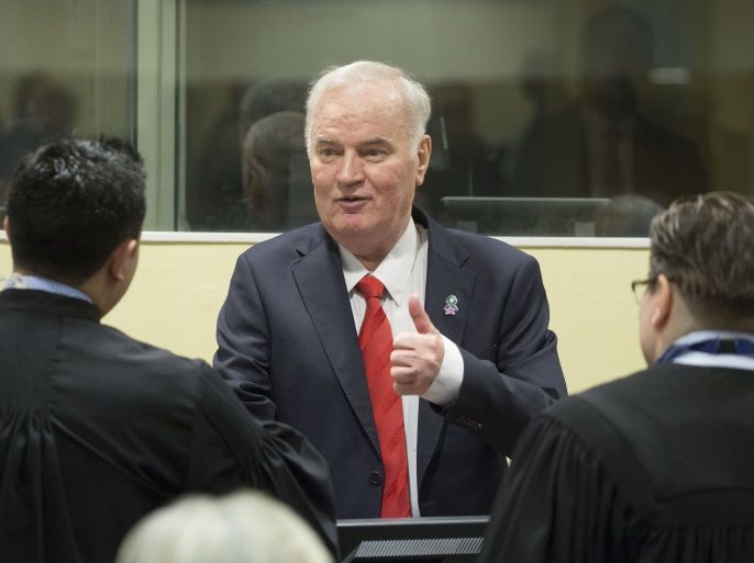 THE HAGUE, NETHERLANDS - NOVEMBER 22: Former Bosnian military chief Ratko Mladic meets his lawyers as he appears for the pronouncement of the Trial Judgement for the International Criminal Tribunal for the former Yugoslavia (ICTY) on November 22, 2017 in The Hague, The Netherlands. UN war crimes judges at The Hague are expected to deliver a verdict on Bosnian Serb military commander Ratko Mladic, dubbed the 'Butcher of Bosnia' today. Mladic, 74, is accused of 11 counts - which include genocide, war crimes and crimes against humanity committed by his forces during the war in Bosnia from 1992 and 1995. (Photo by Michel Porro/Getty Images)