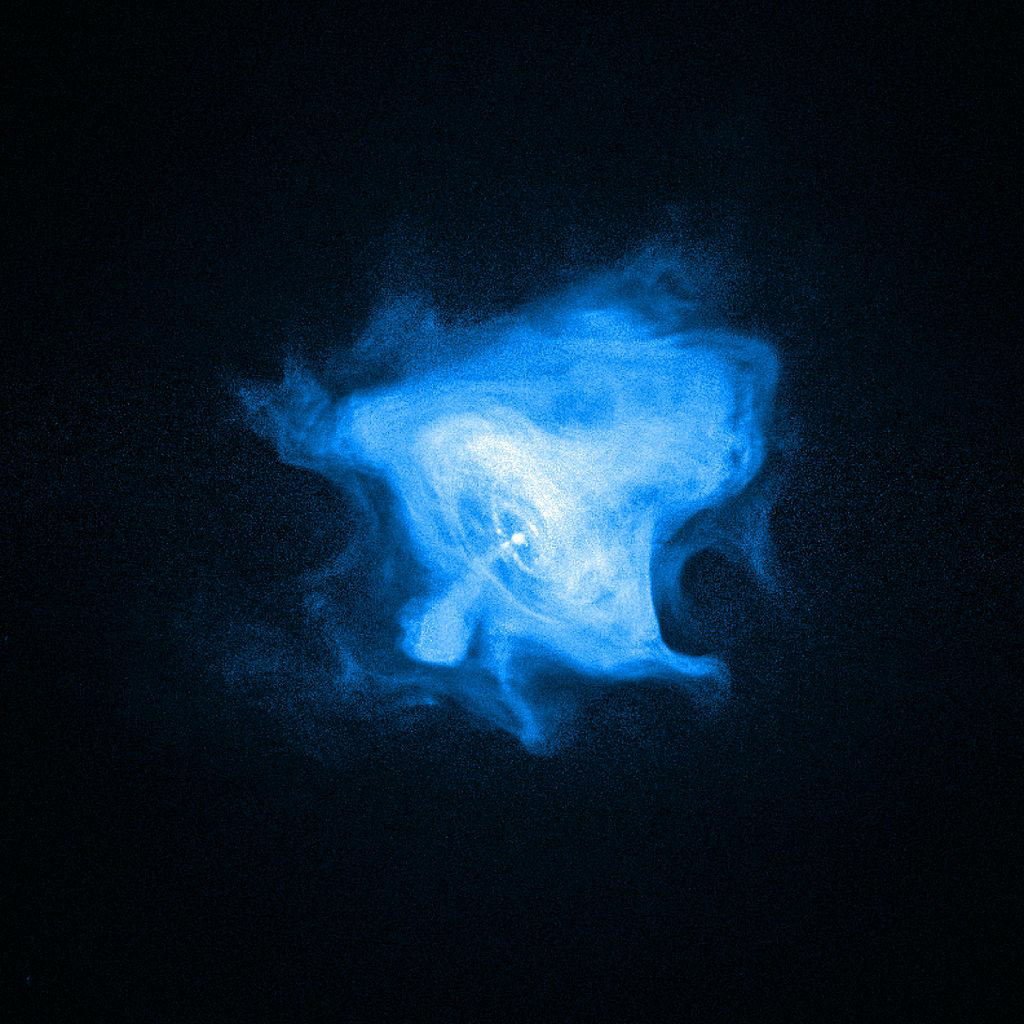 سديم السرطان، لكن هذه المرة الصورة من التلسكوب تشاندرا في نطاق الأشعة السينية، كما تلاحظ يتسبب النجم النابض في المركز في حركة دائمة دوّامية للطاقة والمادة في السديم، يدور هذا النجم 30 لفة بالثانية الواحدة. (مواقع التواصل)