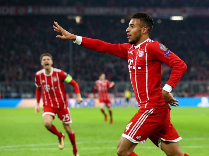 MUNICH, GERMANY - DECEMBER 05: Corentin Tolisso of Bayern Muenchen celebrates after scoring his sides third goal during the UEFA Champions League group B match between Bayern Muenchen and Paris Saint-Germain at Allianz Arena on December 5, 2017 in Munich, Germany. (Photo by Alexander Hassenstein/Bongarts/Getty Images)